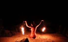 Mysterious Milf Gives Amazing Fire Dancing Performance 
